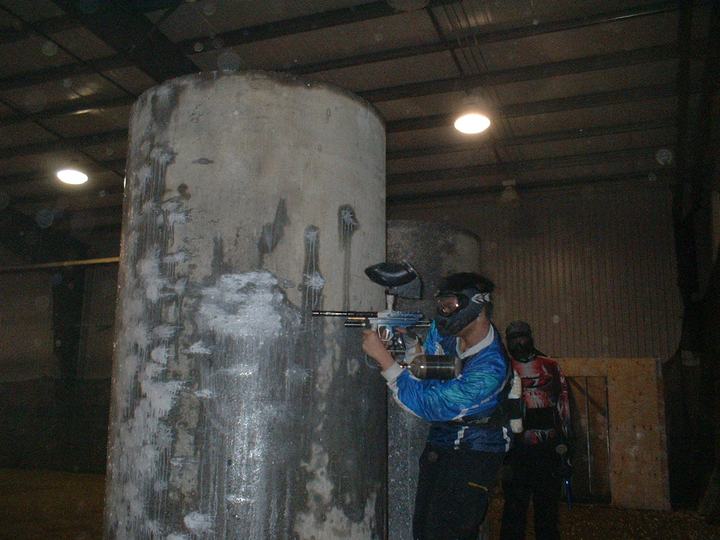 Indoor play behind a paint-covered pillar